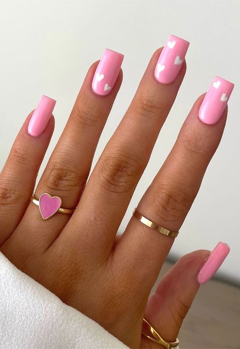 Valentine’s Day Nail Art Collection : Minimal Pink Nails with Love Hearts Pink Nails Love Heart, Pink Hearts Nail Designs, Pink Nail Designs With Hearts, White Heart On Pink Nails, Pink Nails With Love Heart, Love Heart Nail Designs, Nails Pink With Heart, Nails With Love Hearts, Pink Nails Red Heart