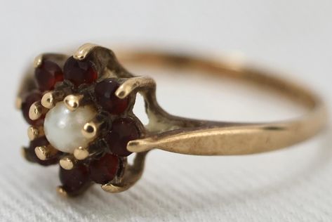 A 9k solid gold split pearl and garnet cluster ring. It weighs 1.2g and is a size 4 3/4. It has hallmarks for Birmingham 1994. It is in good condition. Price: $200AUD Cluster Ring, Birmingham, Hallmark, Garnet, Solid Gold, Split, Size 4, Ring, Gold