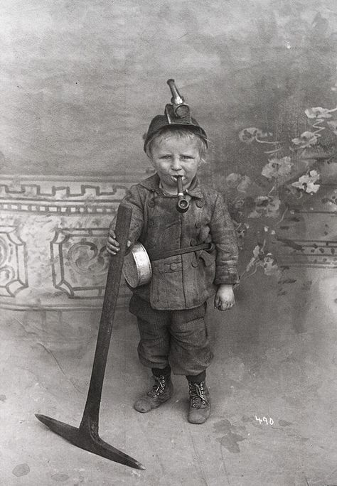 8 year old coal miner, USA, early 1900’s.Children were cheap labor in the mines. He cleaned and played the part of a canary (kids were easier to replace than good miners). Probably Finnish or Swedish & indentured to the company for paying his father's debts to the company store. Coal Miners, Foto Tips, Ansel Adams, Nagasaki, Coal Mining, Interesting History, Hiroshima, White Photo, Vintage Pictures