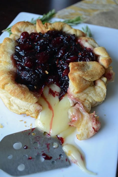 You really can't top melted, gooey cheese. Get the recipe from Sarcastic Cooking.   - Delish.com Cranberry Baking, Fingerfood Party, Baked Brie, Thanksgiving Appetizers, Buffalo Wings, Snacks Für Party, Party Food Appetizers, Cranberry Sauce, Finger Food