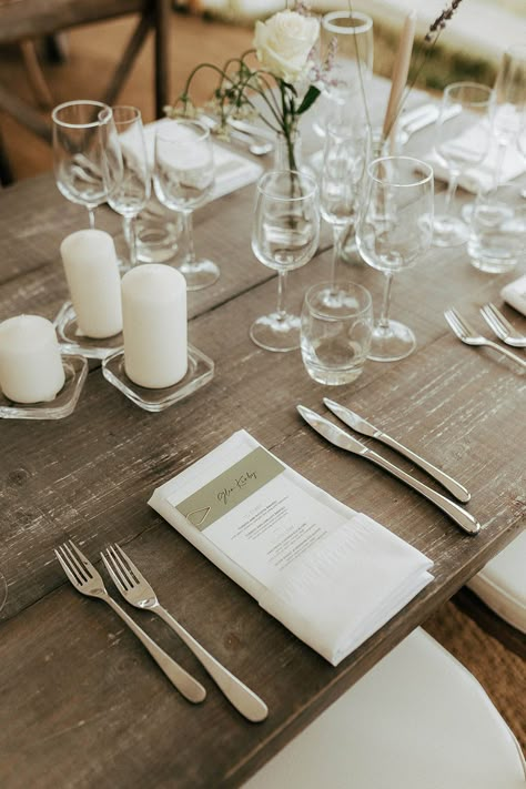 Classic white stationery on wooden banquet table for marquee reception Wedding Table No Linens, Wedding No Plate Table Setting, Wedding Table Settings No Flowers, Buffet Place Setting Wedding, Wedding Tables No Place Settings, Wedding Table Stationary Place Settings, Wedding Table Set Up No Chargers, Wedding Place Settings No Chargers, Wedding Place Settings Without Plates Menu Cards