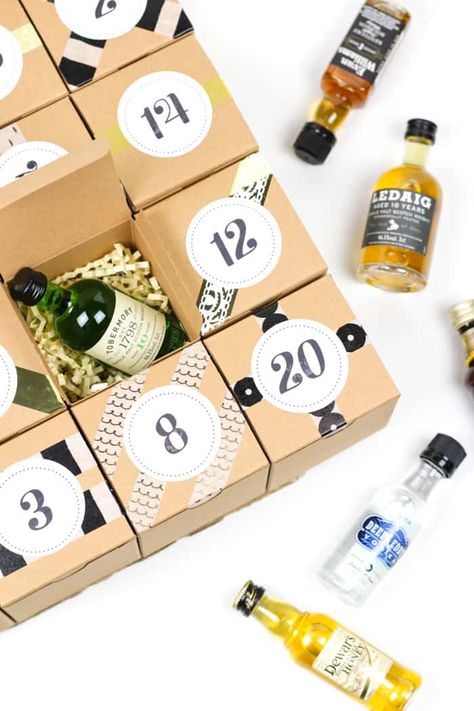 Count down to Christmas with a DIY Booze Advent Calendar! Filled with 25 mini liquor bottles, this project makes the perfect holiday gift for a friend who loves making cocktails. Learn how to make your own, with free printable advent calendar labels! (via feastandwest.com) Mini Liquor Bottle Advent Calendar, Booze Advent Calendar Diy, Alcohol Advent Calendar, Advent Calendar For Men, Adult Advent Calendar, Beer Advent Calendar, Wine Advent Calendar, Mini Alcohol Bottles, Make An Advent Calendar