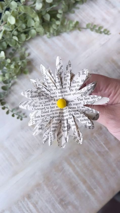 “Don’t you think daisies are the friendliest flower?” Name that movie? I think Kathleen Kelly was right - they really are ❤️ And these DIY book page daisies are the perfect spring/summer craft. A couple of tips: 🌼 You need 3 slightly different squares (I used 4 inch, 3.5 inch and 3 inch) 🌼 Fold them up like little paper airplanes and cut rounded V shapes (think half petals) don’t forget to snip the tip! 🌼 CAREFULLY unfold them. They’re kinda fragile. 🌼 You could also do it with white or an Daisy Crafts, Kathleen Kelly, Rock Candy Sticks, Upsy Daisy, Paper Daisy, Mini Flowers, Book Page Crafts, Summer Craft, Boutique Ideas