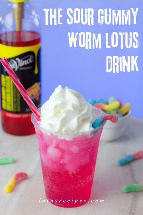 the sour gummy worm lotus drink-pin image Purple Lotus Drink Recipes, Sour Candy Drink, Sour Drink Recipes, Pink Lotus Energy Drink Recipes, Lotus Combos, Lotus Flavors, Lotus Energy Drink Recipes, Lotus Drink Recipes, Lotus Energy Drink Flavors