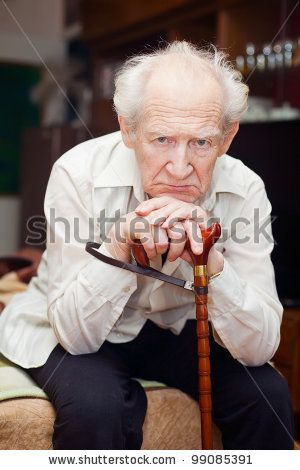 unhappy old man sitting on a bed and holding his cane by Anna Lurye, via ShutterStock Old Man Portrait, Spanish Grammar, Sketches Of People, Man Sitting, Sitting Poses, Learn Spanish, First Novel, Old People, Male Portrait