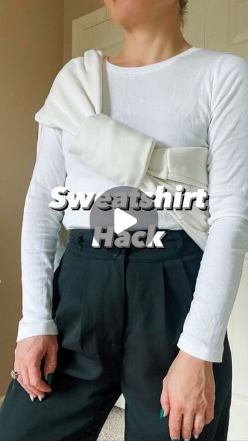 Natalia| Fashion Tips on Instagram: "An easy sweatshirt/sweater/hoodie hack. 1. Tie in the middle 2. Fold the top sleeve over the knot 3. Bring the bottom sleeve over & fold  . . . . . #sweatshirthack #tipsandtricks #clothinghacks #sweatshirtseason #fashiontips #easyhacks #fashiontutorial #howtotie #fashiontipsandtricks" Jacket Tied Around Shoulders, Knotted Sweater, Clothes Hacks, Tie Sweater, Fashion Tutorial, Style Hoodie, Clothing Hacks, The Knot, In The Middle