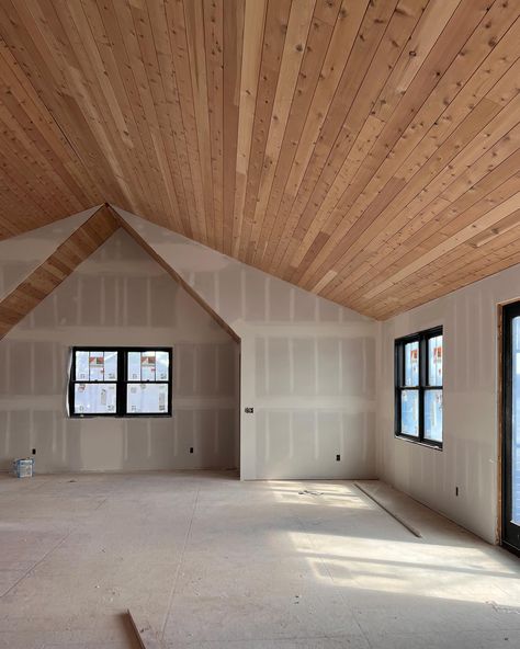 WOOD CEILING TRANSFORMATION. We had big dreams of a beautiful natural wood ceiling in the guest house but when we saw the red/orange ceiling we felt defeated. After considering our options of staining or painting we had a few samples boards made and found the perfect solution. Scroll all the way to the end for photos of the products used to achieve the lighter more natural looking wood. #woodceiling #guesthouses #vaultedceiling #naturalwood #modernrustic #rusticmodern Wood Ceilings Concrete Floors, Wood Paneled Vaulted Ceiling, Wood Ceilings Vaulted, Vaulted Wood Plank Ceiling Living Room, Wood Slanted Ceiling, Vaulted Ceiling Wood Paneling, Tongue And Groove Vaulted Ceiling Living Rooms, Pine Wood Ceiling Living Room, Wood Floors And Ceilings