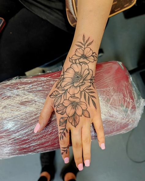 Flowers Tattoo Hand Women, Flower Hand Tattoo Stencil, Flower On Thumb Tattoo, Wrap Around Wrist Hand Tattoo, Poppy Flower Hand Tattoo, Cherry Blossom Hand Tattoos For Women, Flowers Tatoos Arms, Arm And Hand Tattoos For Women, Hand Flower Tattoos For Women