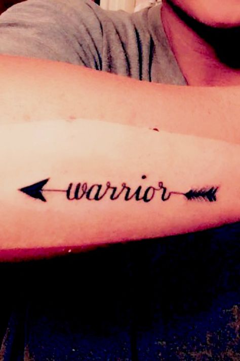 Warrior With Arrow Tattoo, Warrior Wrist Tattoo, Arrow Warrior Tattoo, Tattoo Ideas Female Warrior, Warrior Arrow Tattoos For Women, Spiritual Warrior Tattoo, Warrior Tattoos Word, Warrior Word Tattoo, Warrior Tattoos For Women Strength