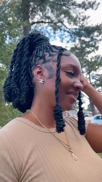 Soft Locs Knots, Barbie Ponytail With Soft Locs, Soft Loc Ponytail Styles, Soft Loc Barrel Style, Soft Locs In Ponytail, Barbie Loc Knot Ponytail, Soft Locs With Knots At The End, Barrel Twist Soft Locs Women, Soft Locs With Charms