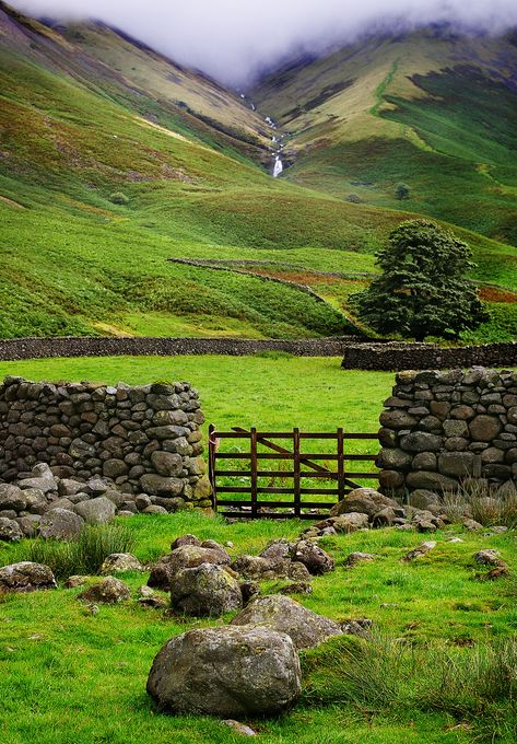 Typical Irish landscape with green galore and stone walls with waterfall and river on the background Ireland Landscape Nature, Landscape Cottage, Aran Islands Ireland, Ireland Aesthetic, Beautiful Ireland, Aran Islands, Ireland Photography, Fairy Pools, Landscape Tattoo