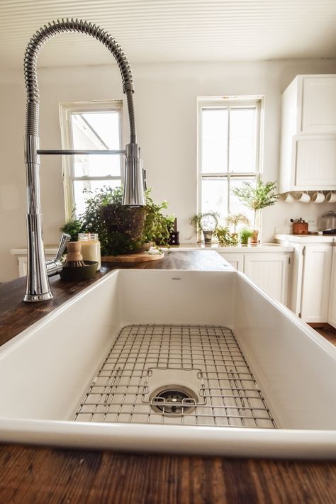 Installing a Sinkology Fireclay Farmhouse Sink in a Vintage Kitchen Island - Midcounty Journal % Vintage Kitchen Island, Farmhouse Bathroom Sink, Farmhouse Sink Faucet, Sink In Island, Fireclay Farmhouse Sink, Farmhouse Apron, Farmhouse Aprons, Fireclay Sink, Fire Clay