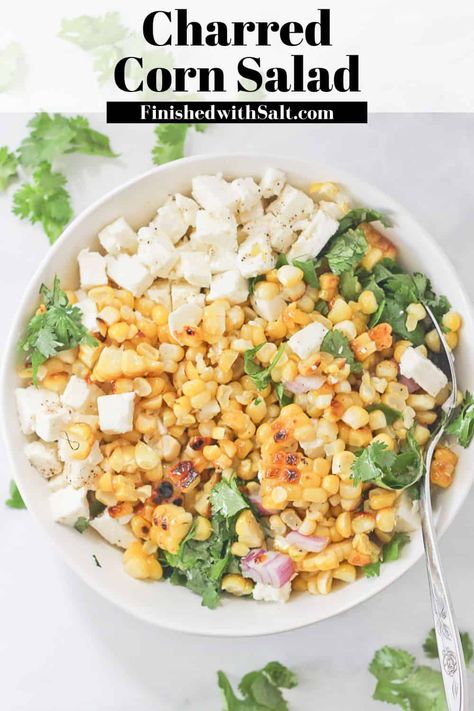 This Charred Raw Corn Salad recipe transforms the summer meets fall fresh corn bounty into a wonderfully easy healthy side dish, perfect for any BBQ or picnic! Made with feta cheese and fresh herbs, you are sure to love it if you are a fan of Mexican corn salads! #finishedwithsalt #corn #salad #sidedish #healthy #summer #bbq #harvest | finishedwithsalt.com Corn Feta Salad, Raw Corn Salad, Easy Healthy Side Dishes, Chicken Quinoa Salad, Baked Pork Tenderloin, Corn Salad Recipe, Bbq Side Dishes Recipes, Bacon Potato Salad, Corn Salad Recipes