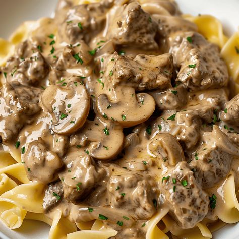 Beef stroganoff is a delicious and comforting dish that takes less than 30 minutes to make. This recipe features tender strips of seared beef and mushrooms in a rich, creamy, and tangy sauce. Serve over Instant Pot Beef Stroganoff Stew Meat, Meat Stroganoff, Keri Meals, Stew Meat Recipes Stove Top, Tenderized Round Steak Recipes, Beef Strog, Beef And Mushrooms, 2024 Meals, Round Steak Recipes