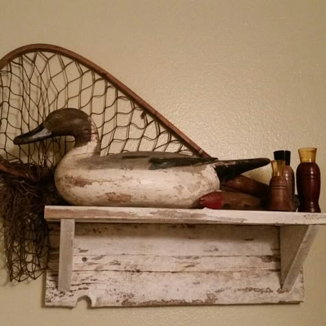 Antique duck,net,fish decoy,and calls Decoy Duck Display, Duck Decoy Display Ideas, Fishing Theme Bathroom, Duck Hunting Lodge Interiors, Duck Decorations Home Decor, Taxidermy Fish Decor, Antique Fishing Decor, Duck Hunting Decorations, Vintage Hunting Decor