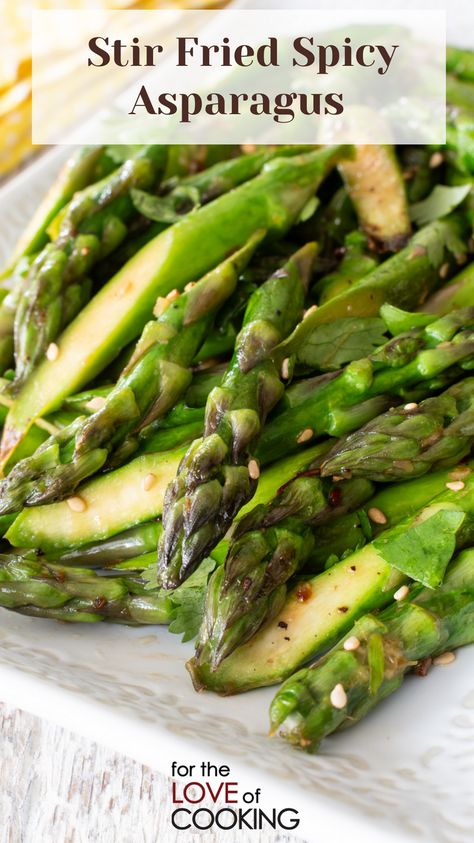 Stir fried spicy asparagus with garlic, ginger, and dried chilies is a quick and delicious side dish that’s on the table in 10 minutes. #recipe #asparagus #sidedish #asianrecipes #vegetarianrecipes #quickrecipes #easyrecipes Stir Fried Asparagus, Mexican Asparagus, Stir Fry Asparagus, Spicy Asparagus, Fried Asparagus, Recipe Asparagus, Asparagus Fries, Quick Side Dishes, Vegetable Side