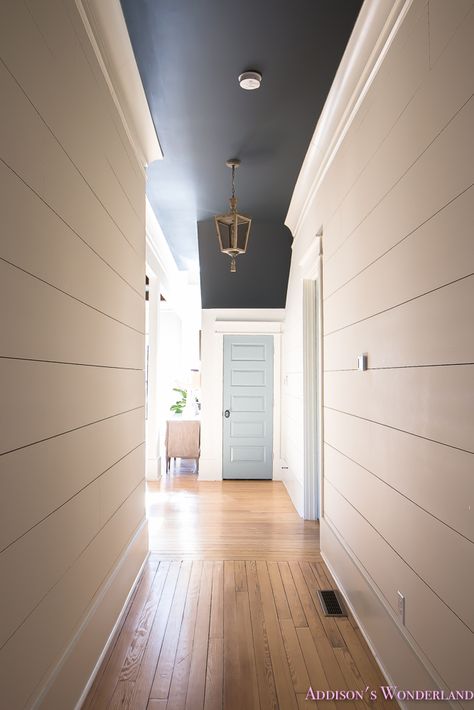 One of my favorite spots in the house... our big ol' hallway reveal! Dark Painted Staircase Walls, Shiplap Hallway, House Hallway, Pearl House, Painted Ceilings, Hallway Ceiling, Hall Designs, Dark Ceiling, Grey Ceiling