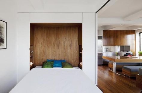 Murphy bed in Transformer Apartment in Chelsea designed by Studio Garneau. Ikea Apartments, Hideaway Bed, Tiny Studio Apartments, Murphy Bed Ikea, Modern Murphy Beds, Murphy Bed Plans, Murphy Bed Diy, Loft Modern, Wall Bed