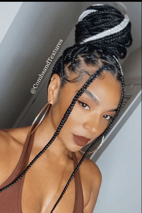 Knotless braids styled into a top bun. Shrunk stripe. Box braids in a top bun. Fulani Braids Ginger, Knotless Braids Styled, Knotless Bun, Medium Large Knotless Braids, Medium Large Knotless, Box Dreads, White Hairstyle, Large Knotless Braids, Woman Long Hair