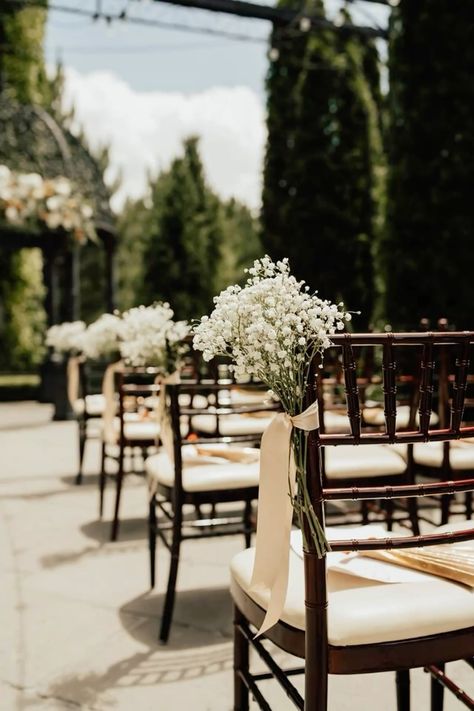 Simple Isle Wedding Decor, Flowers Tied To Chairs Wedding, Wedding Ceremony Outside Decor, Wedding Aisle Benches Decor, Baby Breathe Weddings, Wedding Chair Idea, Minimalist Wedding Ideas On A Budget, Wedding Chair Flower Decor, Sweetheart Table Baby's Breath