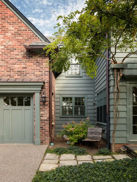 Green siding with red brick is a beautiful pairing of color and texture for a home's exterior. Orange Brick Houses, Red Brick House Exterior, Green Siding, Brick Siding, Orange Brick, House Trim, Red Brick House, Exterior Paint Color, Brick Exterior House