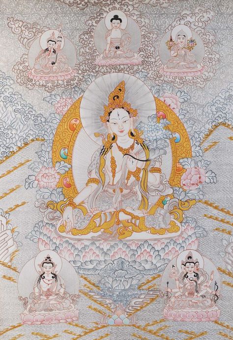 The White Tara or “White Saioress” is said to have born from a tear of the Bodhisattva of compassion. She holds a very prominent position in Tibet. Here White Tara is seen seated on a lotus throne. Her body is white and she is seated in the Vajra posture. Her left hand, which is placed on her heart, holds the stem of a blossoming lotus beside her left shoulder. #Zen Buddhism#Tibetan Thangka#Buddhist Art White God, Tibet Art, Guru Rinpoche, White Tara, Ancient Paintings, Thangka Painting, Buddhist Art, Acrylic Colors, White Painting