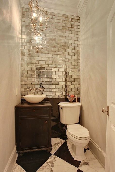 Get creative with mirrors. | 31 Tiny House Hacks To Maximize Your Space Mirrored Subway Tile, Tiny House Hacks, Herringbone Backsplash, Subway Tiles, Small Bath, Bad Design, Mirror Tiles, Joanna Gaines, Style At Home