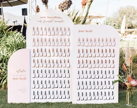 Amy Park on Instagram: “Loved my brides idea of luggage tags as escort cards and also as favors! Was a little nervous about this installation because we did it on…” Travel Tag Wedding Favor, Luggage Tag Wall Wedding, Luggage Tag Wedding Favors Display, Travel Tag Seating Chart, Plane Ticket Seating Chart, Luggage Tags For Wedding Guests, Luggage Tag Name Places, Wedding Seating Chart Luggage Tags, Boarding Pass Seating Chart