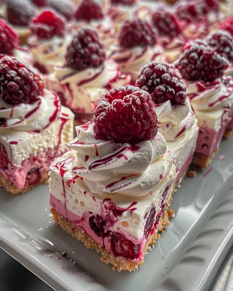 BERRY SWIRL CHEESECAKE BITES 🍓 Ingredients: For the Crust: 1 1/2 cups graham cracker crumbs 1/4 cup granulated sugar 1/2 cup unsalted butter, melted For the Cheesecake Filling: 16 oz cream cheese, softened 1/2 cup granulated sugar 2 large eggs 1 tsp vanilla extract 1/2 cup sour cream For the Berry Swirl: 1 cup mixed berries (such as strawberries, blueberries, raspberries), fresh or frozen 2 tbsp granulated sugar 1 tbsp lemon juice 1 tbsp cornstarch 2 tbsp water Directions: Step 1: Prepare... Cooking Goals, Swirl Cheesecake, Cheesecake Cups, Sweet Temptation, Strawberries Blueberries, Cheesecake Filling, Cheesecake Bites, Food Pics, Delicious Snacks Recipes