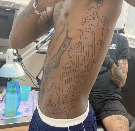 Swag Tattoo Ideas, Waistline Tattoos For Men, Collar Bone Tattoo Writing, Steve Lacy Tattoo Ideas, Steve Lacy Tattoo, Back Tattoos For Men, Chrome Hearts Neck Tattoo, Cybersigilism Tattoo Chest, Chrome Hearts Tattoo