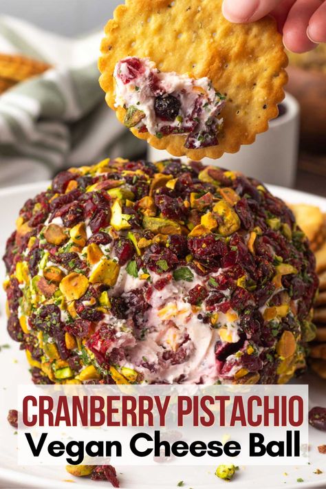 This festive Cranberry Pistachio Vegan Cheese Ball is the perfect no-bake appetizer to share with family and friends. This delicious cranberry pistachio vegan cheese ball is guaranteed to be the star of the show at any gathering! Vegan Cheeseball, Cranberry Cheese Ball, Vegan Cheese Ball, Cheeseball Recipe, Baked Appetizers, Vegan Appetizer, Vegan Party Food, Fall Vegan Recipes, Vegan Holiday Recipes