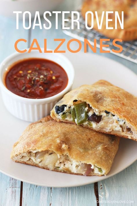 Toaster oven calzones are easy to make with store-bought pizza dough, cheese, and your favorite fillings. Use our step by step directions for roasting vegetables and baking calzones in a toaster oven to make two generously sized hot pockets of yum. They're a great dinner for one or two. Easy Toaster Oven Meals, Toaster Pizza Pockets, Reheat Calzone In Air Fryer, Tortilla Pizza In Toaster, Cheap Pizza Calzones, Toaster Oven Cooking, Convection Oven Recipes, Asparagus Dishes, Toaster Oven Recipes