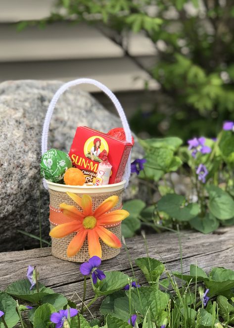 Here's a short video for a DIY May Basket using an empty yogurt cup and some inexpensive craft ribbons and flowers! Spring Basket-shaped Paper Straw Bag, May Basket, May Day Traditions, Basket Printable, Miniature Picnic Basket, May Baskets, Yogurt Cup, May Day Baskets, May Days