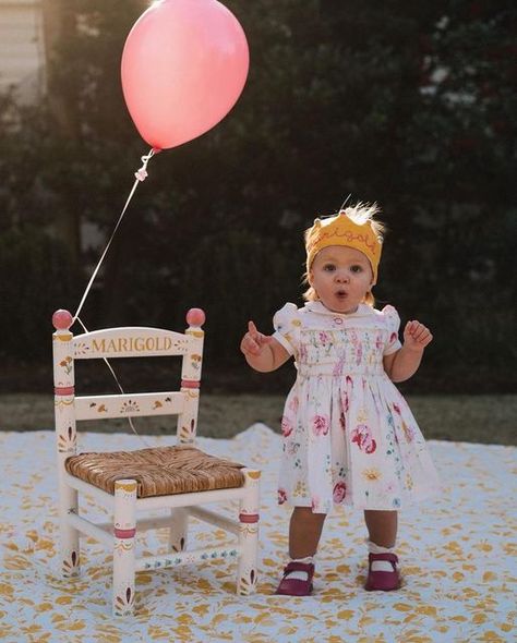 p i e r r o t on Instagram: "🎈 Marigold Bee with her birthday chair, and we painted one for her big sister Clementine Daisy’s 1st birthday a couple of years ago too 🍊🌼 The sweetest pair of girls and chairs! Thank you for finding us @juliaberolzheimer 💕" Birthday Chair, Berry 1st Birthday, 1st Birthday Photoshoot, Julia Berolzheimer, March Birthday, Parties Ideas, First Birthday Themes, Painted Chairs, Turning One