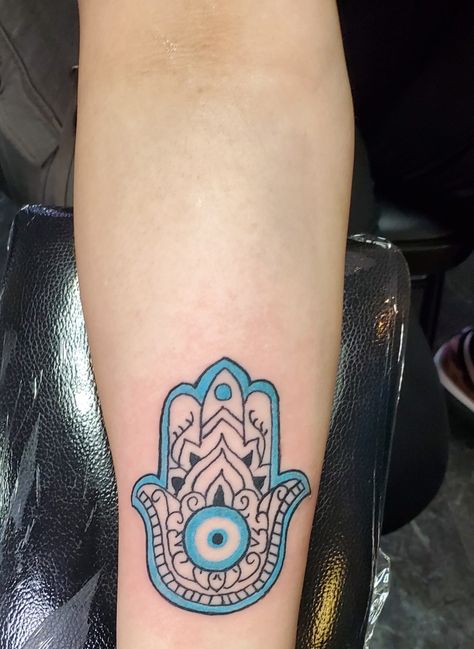 Hamsa hand tattoo Hamza Hand Tattoo, Hamsa Hand Traditional Tattoo, Hand Of Fatima Tattoo Small Evil Eye, Hamsa Hand With Evil Eye Tattoo, The Hamsa Hand Tattoo, Simone Tattoo, Colored Hamsa Tattoo, Fatima Hand Tattoo, Hamsa Tattoo Design