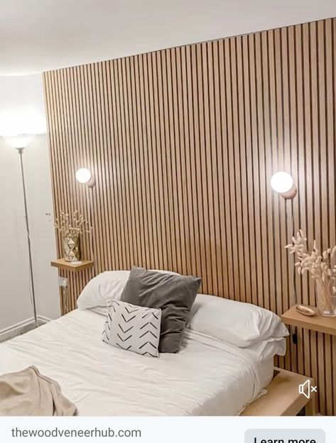 Slat Wall Above Bed, Wood Design Behind Bed, Pole Wrap Bedroom Wall, Wooden Slat Bedroom, Diy Wood Slat Headboard, Wooden Panel Bed, Daisy Bedroom, Light Gray Bedroom, Headboard With Shelves