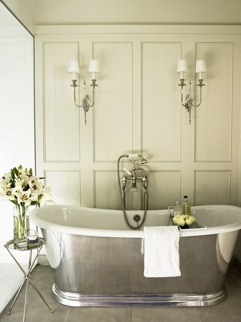 This French Style Bath Decor features a Gorgeous Freestanding Oval Cast Iron Bathtub - Candide Collection by Waterworks. The slender and streamlined curves are accentuated as the tub stands on its molded base. French Inspired Bathroom, French Style Bathroom, French Country Decorating Bathroom, French Bathroom Decor, Country Bathroom Designs, Country Bathroom Decor, French Bathroom, Bathroom Paneling, French Country Bathroom