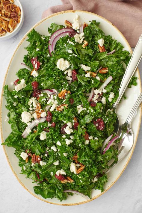 The trick to this Massaged Kale Salad is rubbing the leaves with dressing until they soften and darken, turning bitterness into deliciousness! This kale salad with feta and pecans is perfect holiday salad recipe. Make this Thanksgiving salad recipe quickly and easily with just a handful of ingredients! | Massaged Kale Salad | Kale Salad | Massaged Kale Salad with Dried Cranberries and Pecans | Kale Salad Recipe | Thanksgiving Salad Recipe | Wl Meals, Salad Recipes Holidays, Feel Good Foodie, Curly Kale, Holiday Salad, Thanksgiving Salad Recipes, Massaged Kale Salad, Salad Kale, Recipe Thanksgiving