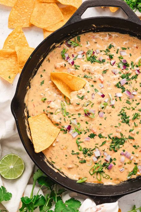 Chile con Queso is a creamy, hearty dip loaded with three cheeses and seasoned ground beef. It's a real crowd pleaser and ready in 15 minutes. Queso With Ground Beef, Chilis Queso Dip, Loaded Queso Dip Recipe, Ground Beef Queso Dip, Ground Beef Queso, Chili Con Queso Dip, Spicy Queso, Nachos Supreme, Seasoned Ground Beef