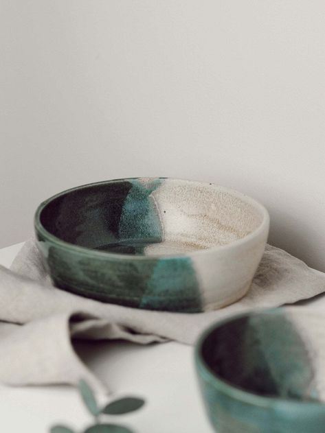 Handmade ceramic bowl with a smooth layered glaze. Approximately 7 3/4" W x 2 1/3" H Microwave and dishwasher safe Maker's stamp on bottom of bowl Handmade in Charlotte's pottery studio in South Fawley, Berkshire. The pottery is made in small batches of around 30 pieces and if carefully formed over a two day period. Beige Pottery, Salad Bowls Ceramic, Ceramic Serving Bowls, Ceramics Bowls Designs, Ramen Salad, Pottery Decor, Handmade Ceramics Plates, Dish Ceramic, Kitchen Plate