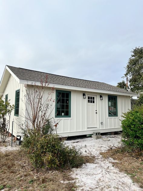 The Exterior of the Beach Shack is Painted & Here's the Color We Chose!! — The Property Lovers Coastal Cabin Exterior, Exterior Beach House Colors, Beach Shack Exterior, Exterior Beach House, Exterior Paint Color Combinations, Coastal Cabin, Beach House Colors, Front Porch Lighting, Painted Interior Doors