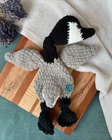 Yesterday I watched the quintessential V of flying Canada Geese migrating to their home for the winter. It always makes me smile. 😊 While crocheted loveys and plushies are most often geared towards children, I have a feeling this goose lovey may end up at a home with adults that appreciate these beautiful birds! Pattern by: @mamamademinis, modified with Canada Goose coloring #crochetlovey #handmadelovey #heirloomquality #uniquecrochet #handmade #canadiangeese #canadagoose #holidaygift #b... Crochet Canada Goose, Goose Lovey, Goose Crochet, Canada Geese, Birds Pattern, Crochet Lovey, Canadian Goose, Unique Crochet, Canada Goose