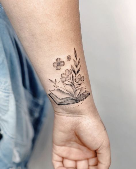 Hand Holding Book Tattoo, Elegant Book Tattoos, Book Knee Tattoo, Fine Like Book Tattoo, Matching Best Friend Book Tattoos, Open Book Tattoo Ideas, Book Plant Tattoo, Book And Sunflower Tattoo, Book And Flowers Tattoo