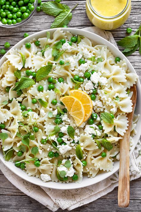 This bow tie pasta salad with lemon vinaigrette is deliciously bright and zesty, with tender peas, fresh mint and savory feta! | thecozyapron.com #bowtiepastasalad #bowtiepastasaladrecipes #bowtiepastasaladcold #bowtiepastasaladeasy #bowtiepastasaladrecipescold #lemonvinaigrette Lemon Bowtie Pasta, Dressing For Pasta Salad, Bowtie Pasta Recipe, Recipe For Pasta Salad, Lemon Vinaigrette Recipe, Bow Tie Pasta Salad, Bow Tie Pasta Recipe, Salad With Lemon Vinaigrette, Lemon Vinaigrette Dressing