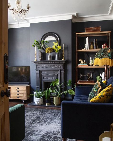 Painting a room black doesn't mean that it will automatically feel gothic. These easy tips and tricks will help you pull off this daring color. Black Room Ideas, Dark Living Room Ideas, Victorian Living Room, Dark Living Rooms, Black Rooms, Black Living Room, Room Black, Dark Interiors, Blue Living Room