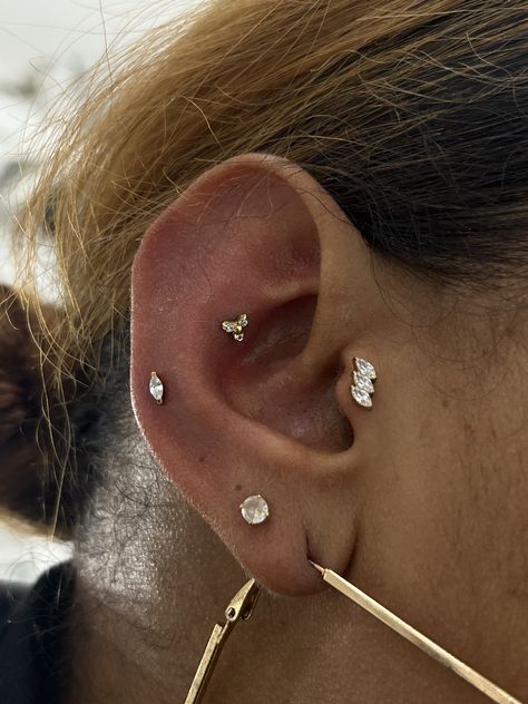 MINI CURATION COMING IN HOT 🔥  TRAGUS, MID HELIX, AND OUTER CONCH BY @lobopiercings   Soho, Union Square, and Williamsburg  11AM-9PM 7 DAYS A/W🕘 WALK-INZ OR BOOK ONLINE..📕 TATTOOS & PIERCINGS, NO ATTITUDE, NO MISERABLE HOOPS TO JUMP THROUGH....🚫 WALK-INZ WELCOME OR BOOK ONLINE AT ⚔️livebytheswordtattoo.com⚔️ . . . . #livebythesword #earcuration #piercingcheck #nycpiercing #piercingjewelry Contra Conch, Mid Helix Piercing, Outer Conch Piercing, Outer Conch, Ear Curation, Pretty Ear Piercings, Cute Ear Piercings, Union Square, Conch Piercing