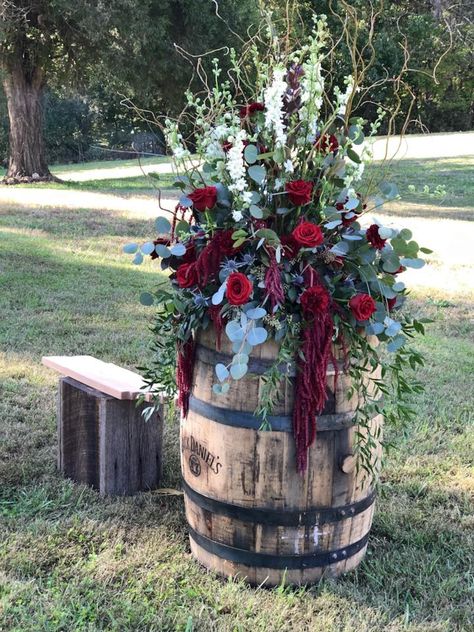 Rustic wedding; Whiskey barrel,  outdoor wedding; fall wedding; fall flowers; burgundy hanging amaranths; silver dollar eucalyptus; seeded eucalyptus; ruscus; blue thistle; heart roses; white larkspur; curly willow; burgundy and white wedding; Wedding Themes Fall Rustic, Barrel Wedding Decor, Rustic Color Schemes, Whiskey Barrel Wedding, Barrel Wedding, Wedding Themes Fall, Wooden Barrel, Fall Wedding Colors, Deco Floral