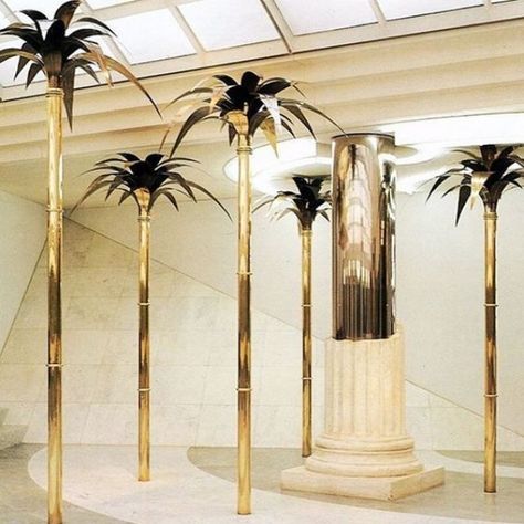 Weekend decorating idea: create your luck with a chic brass palm tree — The Decorista 80s Interior, Luxury Modern Homes, Robert Mapplethorpe, New Retro Wave, Jw Marriott, David Hockney, House Entrance, Travel Agency, Postmodernism