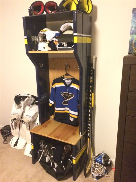 Hockey Locker made from an old bunk bed.                                                                                                                                                                                 More Hockey Equipment Storage, Hockey Stick Furniture, Hockey Locker, Hockey Room Decor, Hockey Diy, Hockey Crafts, Hockey Bedroom, Diy Locker, Hockey Room