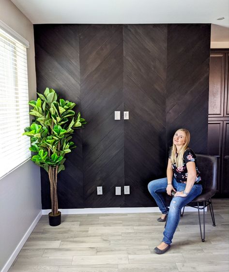 Black wood plank chevron living room accent wall with Minwax true black stain Modern Plank Wall, Chevron Accent Wall Bedroom, Stained Wood Accent Wall Bedroom, Wood Chevron Wall, Stained Wood Accent Wall, Black Herringbone Wall, Black Wood Accent Wall, Wood Plank Accent Wall, Wood Wall Treatments